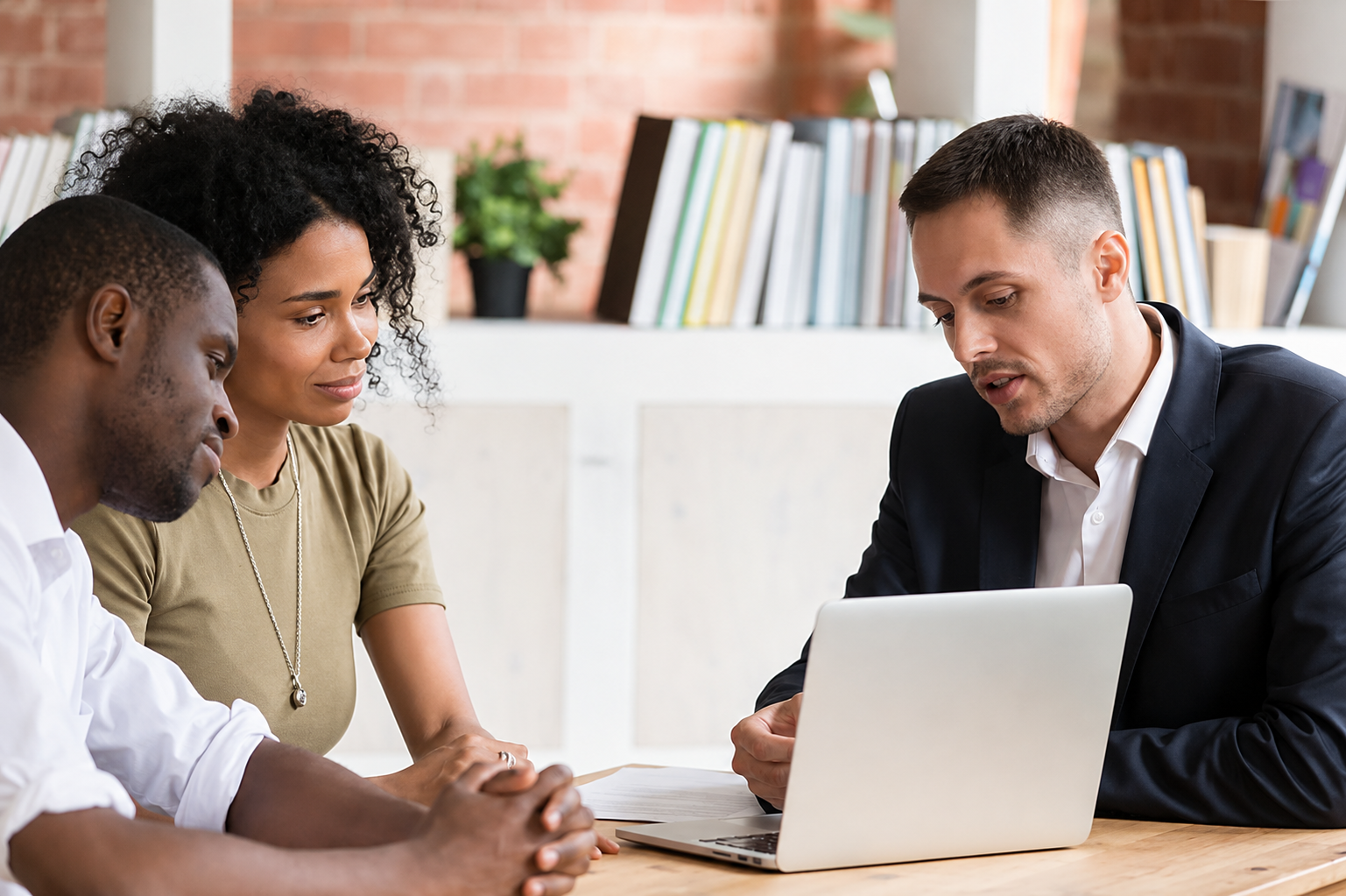 Mortgage consultant meeting with homeowners